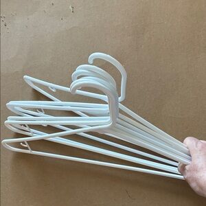 FREE six white plastic coat hangers EUC